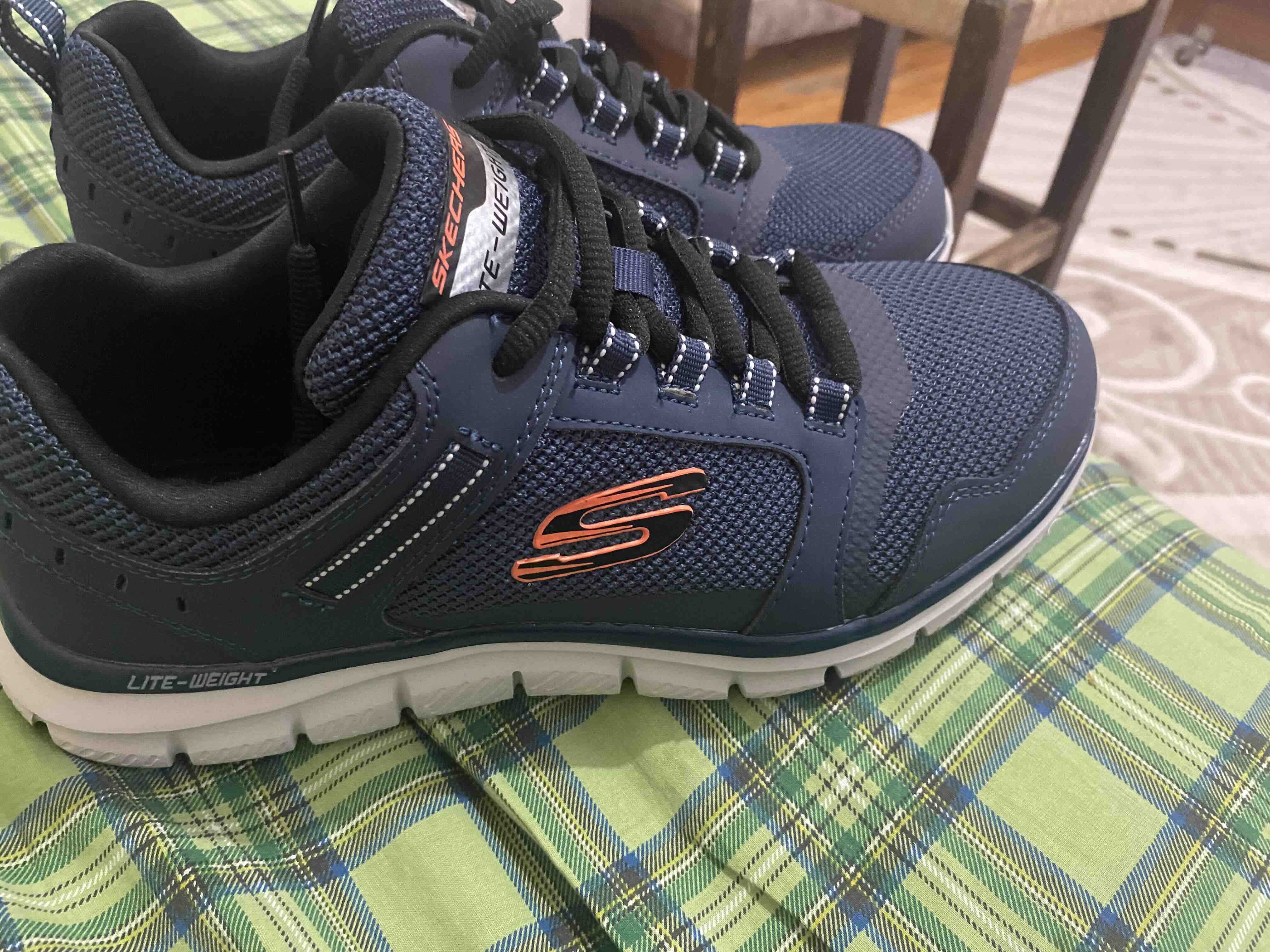 کفش پیاده روی مردانه اسکیچرز Skechers اورجینال 232001/NVOR photo review